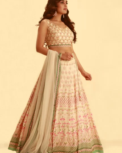 pink printed lehenga set with contrast fern green colour and matching tulle dupatta